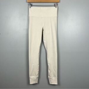 Athleta ivory oatmeal color Softluxe Cuffed Tight, size small.